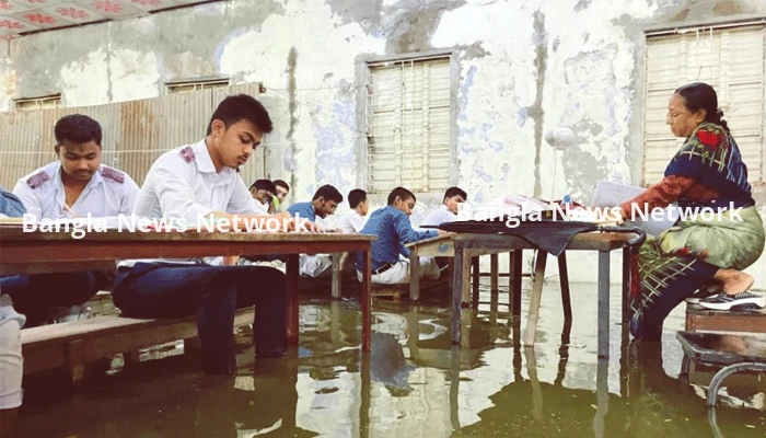 হাঁটুপানিতে বসে এসএসসি পরীক্ষা দেওয়ার ছবি ভাইরাল, নড়েচড়ে বসল প্রশাসন